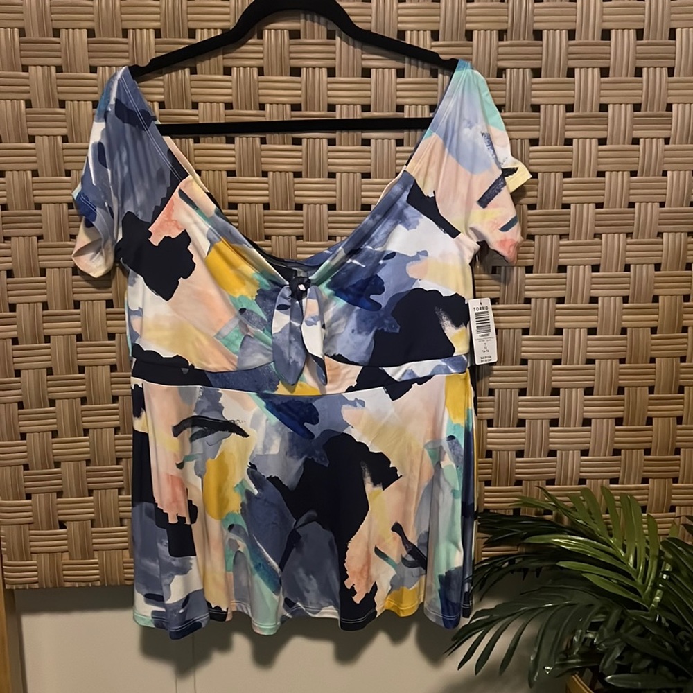 💙💚💛🤍TORRID New w/tag babydoll top🤍💛💚💙